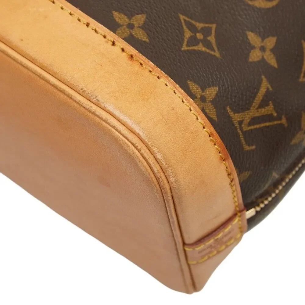 Louis Vuitton Alma PM Monogram Handbag